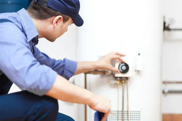 plumber-repairing-a-water-boiler-for-a-plumbing-repair-service